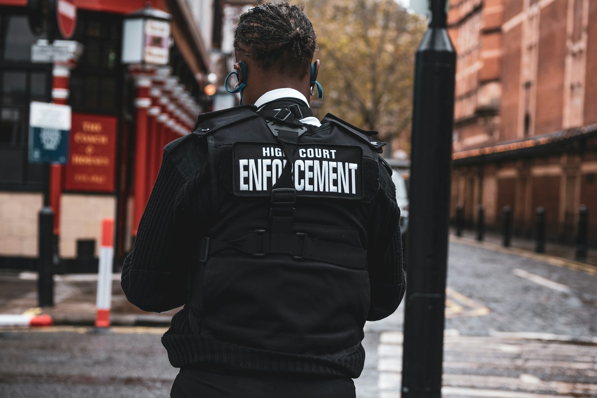man in black and white adidas jacket wearing black and white headphones